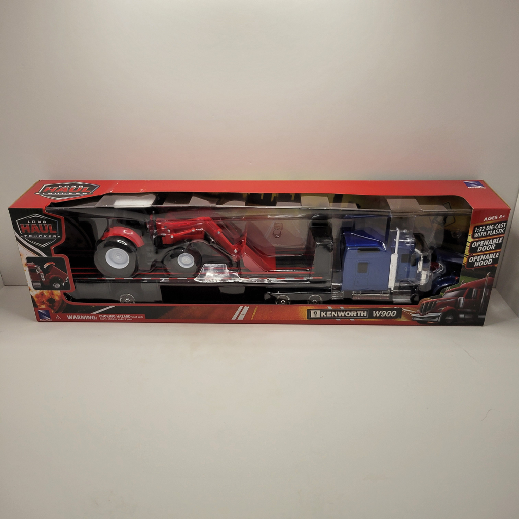 New Ray - Long Haul Trucker - Kenworth W900 Flatbed with Kubota 1/32