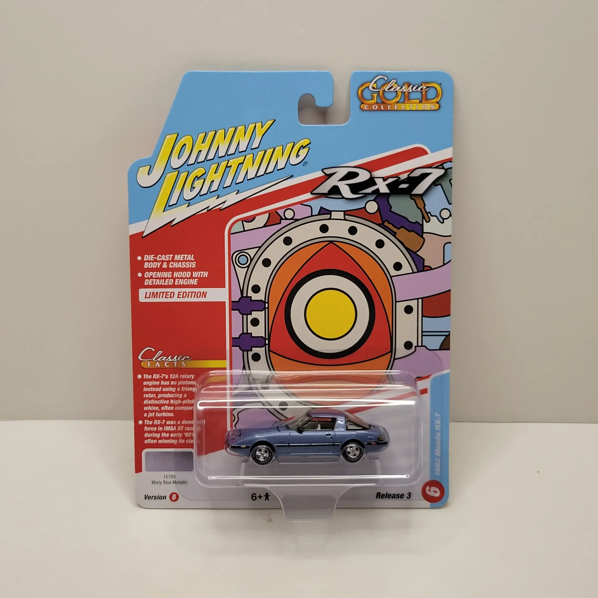 Johnny Lightning Classic Gold - 1983 Mazdad RX-7 1/64