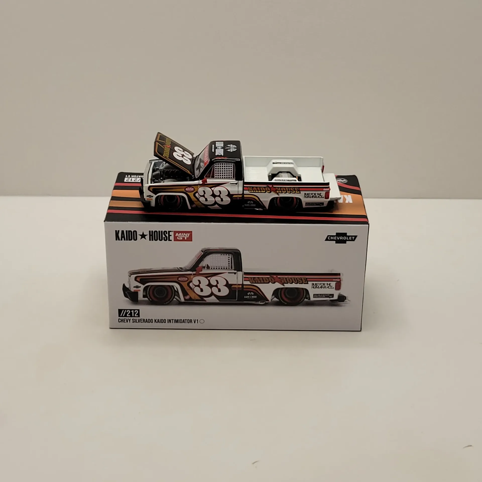 Kaido House Mini GT #212 - Chevy Silverado Kaido Intimidator V1 1/64 (Scellé)
