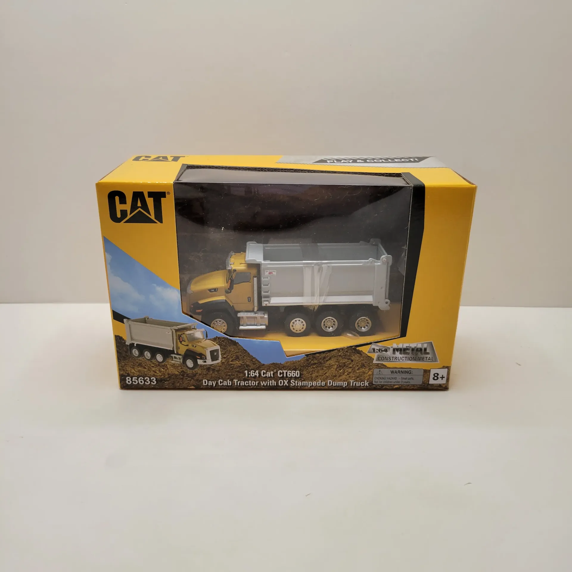Diecast Masters - CAT - CT660 Day Cab Tractor with OX Stampede Dump Truck 1/64